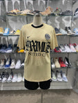 TRAVIS SCOTT NIKE COMPLEXCON MAXIMUS SOCCER JERSEY GOLD