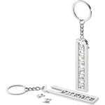 SUPREME SLIDE KEYCHAIN SILVER FW22